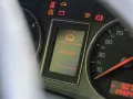 Na desce rozdzielczej Audi A3 8P świeci się kontrolka "SERVICE!", sygnalizując potrzebę przeglądu.