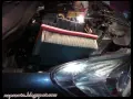 Wymiana filtra kabinowego Opel Corsa D. Nowy filtr czeka na montaż w komorze silnika.