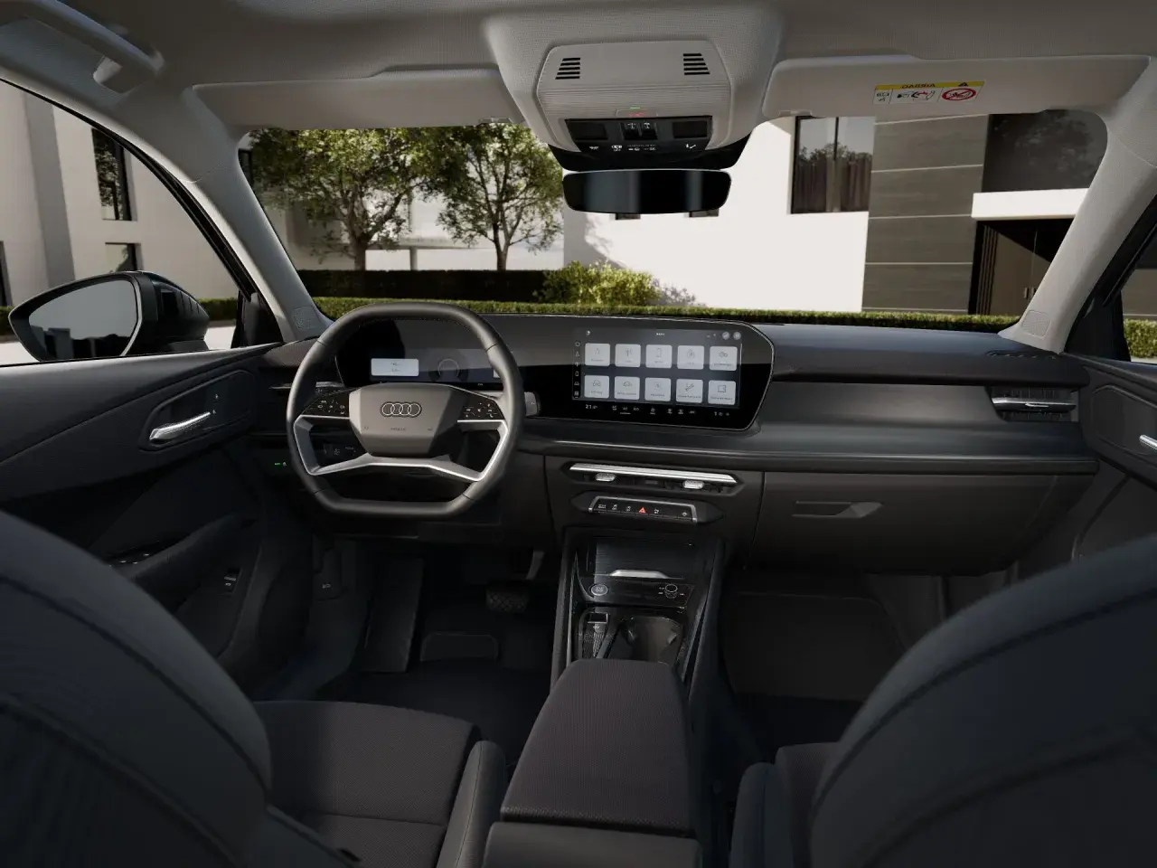Nowoczesne audi q3 sportback wnętrze z dużym ekranem dotykowym i cyfrowymi zegarami.