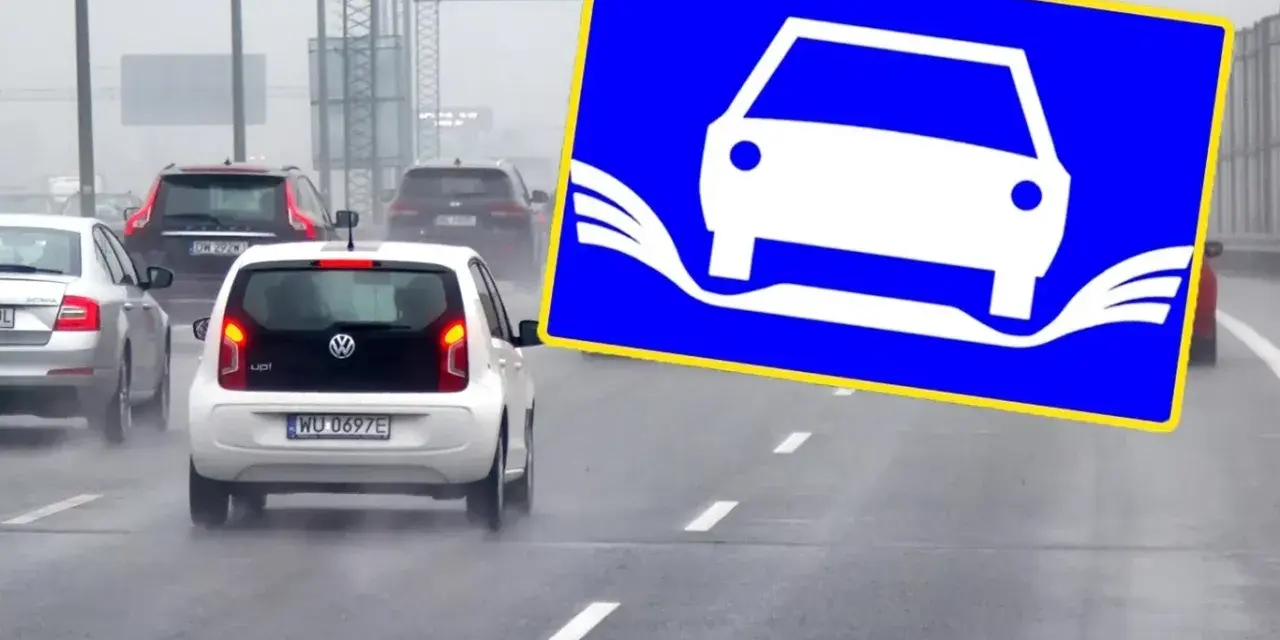 Na drodze mokry ruch, znak ostrzega przed aquaplaningiem. Wegfahrsperre aktiv, bo woda na jezdni może spowodować utratę kontroli.