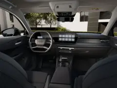 Nowoczesne audi q3 sportback wnętrze z dużym ekranem dotykowym i cyfrowymi zegarami.