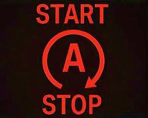 Czerwona kontrolka start stop z literą A w okręgu.