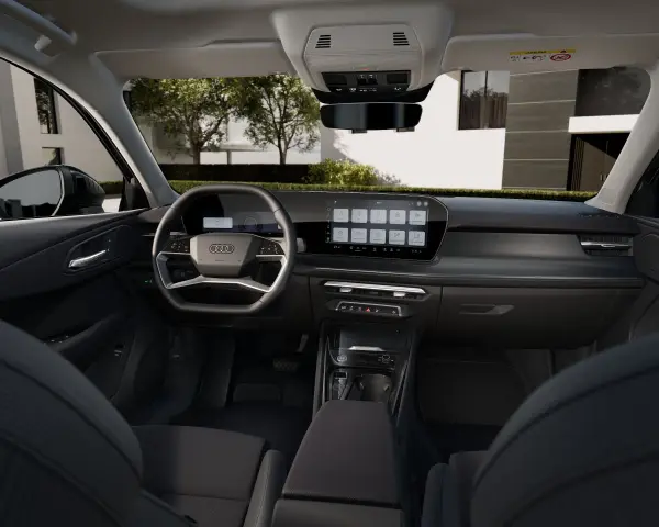 Nowoczesne audi q3 sportback wnętrze z dużym ekranem dotykowym i cyfrowymi zegarami.