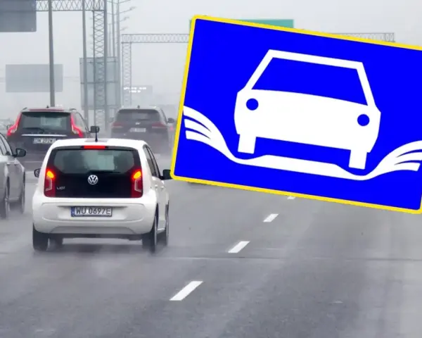 Na drodze mokry ruch, znak ostrzega przed aquaplaningiem. Wegfahrsperre aktiv, bo woda na jezdni może spowodować utratę kontroli.