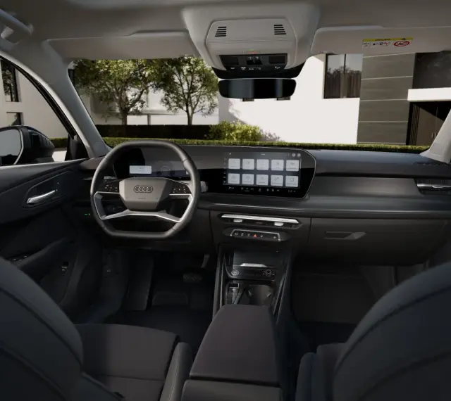 Nowoczesne audi q3 sportback wnętrze z dużym ekranem dotykowym i cyfrowymi zegarami.
