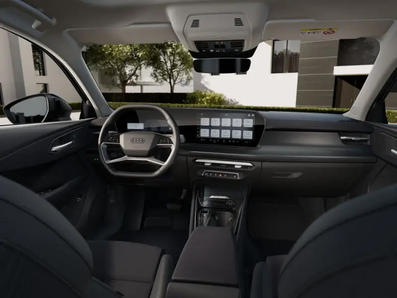 Nowoczesne audi q3 sportback wnętrze z dużym ekranem dotykowym i cyfrowymi zegarami.